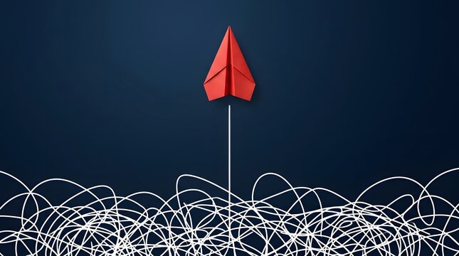 Red paper airplane ascending from tangled white scribble lines on dark blue background. Concept of business solutions, and strategic direction.
