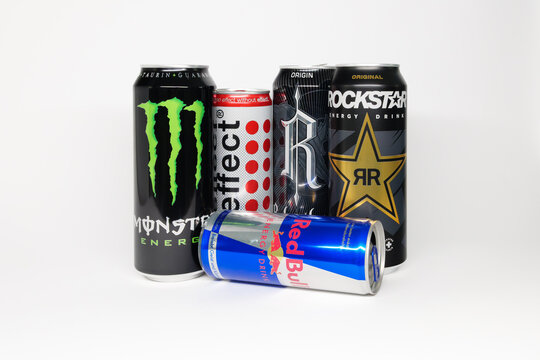 DRESDEN, GERMANY - 21. June 2026: Energy drink cans of popular brands on white background. Monster beverage, effect, Relentless, Rockstar and Red Bull. Variety of sweet and caffeinated drinks.
