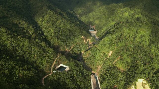 Obi, Caramoran, Catanduanes, Philippines - A Scenic View of Lush Green Hills, Winding Paths, and a Peaceful Mountain Landscape - Aerial Drone Shot