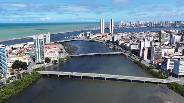 Riverfront Scene In Recife In Pernambuco Brazil. Beautiful Cityscape. Downtown District. Riverfront Landscape. Riverfront Scene In Recife Pernambuco Brazil Northeast. Peaceful Landscape Aerial View.