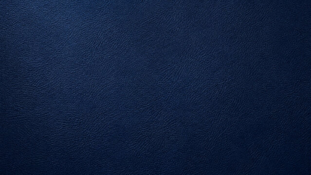 Dark blue leather texture close up with subtle grain and shading
