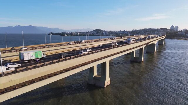 Aerial View of Pedro Ivo Campos and Colombo Salles Bridges with City Traffic and Ocean Coastline in Florianopolis Santa Catarina Brazil
