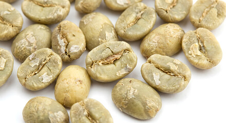 Obraz premium Macro Raw Green Coffee Beans on White Background
