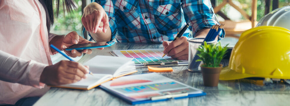 Banner construction engineer office desk architect workplace. Diversity Coworker Engineer team hands partnership. Support team greeting teamwork colleagues with copy space. Banner Teamwork Warehouse