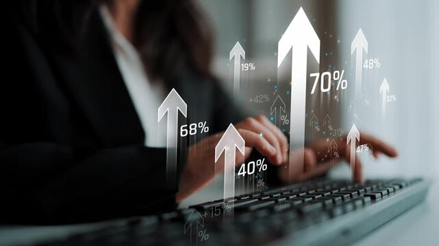 Business professional working on laptop while analyzing growth data with overlaid upward arrows demonstrating positive trends and performance metrics Sigmoid