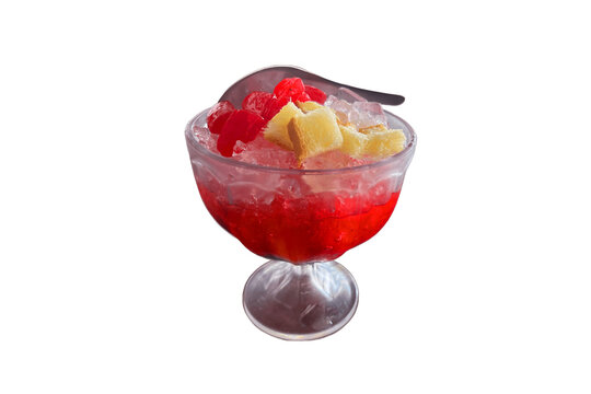 es campur or mixed ice is Indonesian fruit cocktail ice dessert mixed with shaved ice, condensed milk, fruit, white bread and syrup. isolated on white background