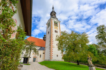 The 17th century bell tower of the Pilgrimage Church of the Assumption of Mary, located on a small island in the middle of Lake Bled in Bled, Slovenia.