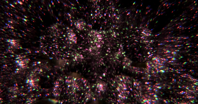 Defocused gleam glimmer. Neon light background. Purple green yellow color glitter lens flare leaking on illuminated creative optical dark black abstraction.