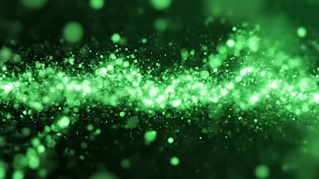 Horizontal green glowing particle stream on black background.