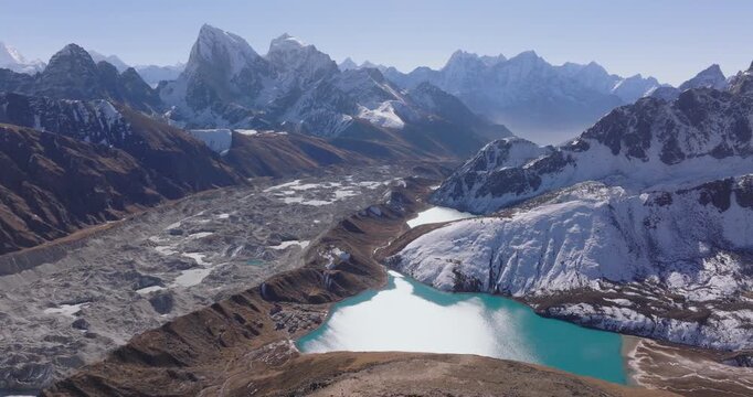 Everest Region, Nepal Aerial view from Gokyo Ri showcasing the turquoise Gokyo Lakes, rugged glacial terrain, and dramatic Khumbu peaks in Nepal's Everest region.