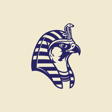 Egyptian pharaoh falcon head emblem with cobra uraeus, dark blue on a light cream background, for historical themes