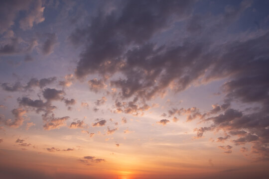 Panoramic view of sunset golden and blue sky nature background.
Colorful dramatic sky with cloud at sunset.Sky background.Sky with clouds at sunset.