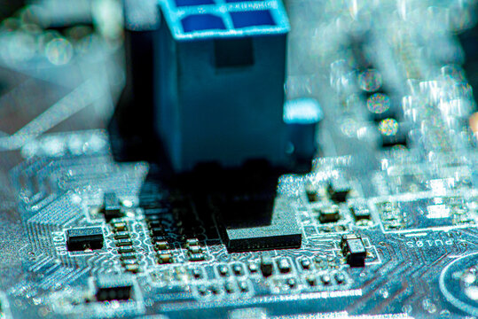 Abstract, Close up at electronic circuits, we see the technology of the mainboard, which is the important background of the computer. Electronic computer hardware technology,Motherboard digital chip.