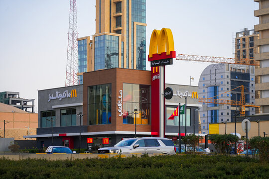 McDonald's fast food restaurant with drive-thru sign and modern architecture in Riyadh, Saudi Arabia