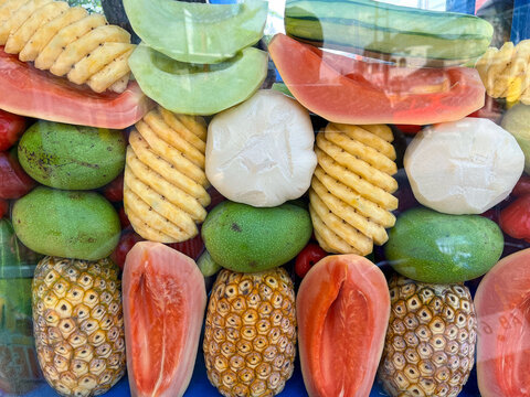 Fresh Tropical Fruit Pattern with pineapple, young mangoes, papaya in colorful arrangement