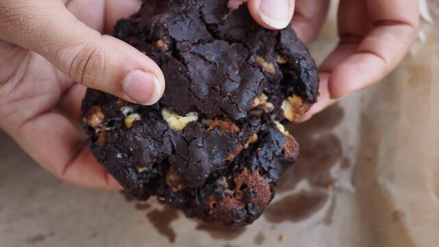 Baking a large chocolate cookie with a unique texture