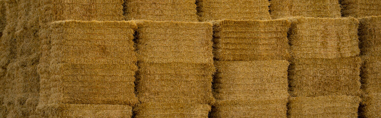 Straw hay background, haystack with straw bale. © Volodymyr