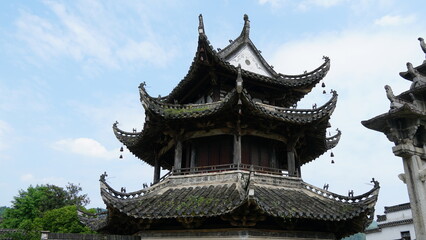 Fototapeta premium The Living Architecture Museum: The Grand Hui-Style Heritage of Xucun Village, Exploring the Imperial Arches and Historic Mansions, A National Cultural Relic Landmark in Huangshan, China