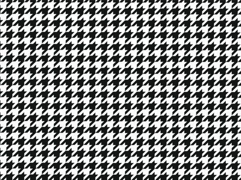 Classic houndstooth seamless pattern in black and white repeat design.