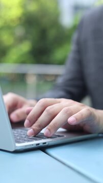 slow motion scene manager businessman hand type on laptop keyboard to search about information or data on internet or working and reply email to client for business and technology concept