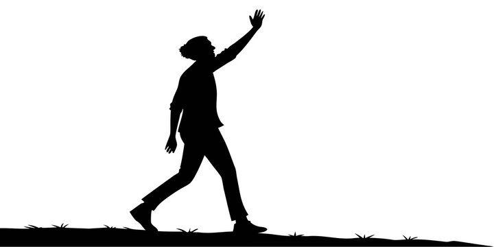 Side view silhouette of a casual man with a top knot walking on grass while waving hello or goodbye with one hand raised high silhouette greeting farewell isolated movement lifestyle traveler