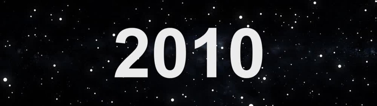 2010 future year concept in deep space with glowing stars and cosmic background.