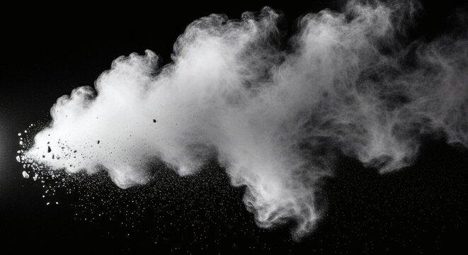 Fine chalk dust cloud dispersing in midair with particles floating against a dark background capturing the delicate and airy texture of powder in motion