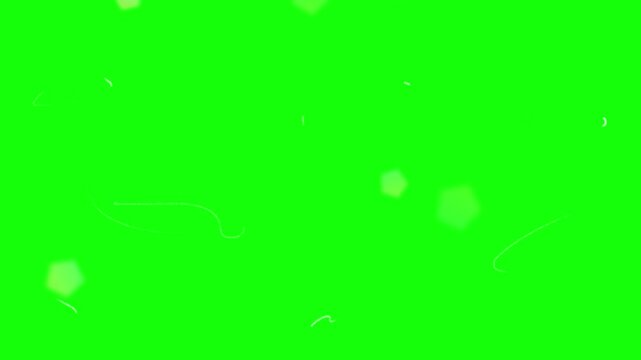 Abstract blurred light particles with pentagonal bokeh effect floating on a vibrant green screen background