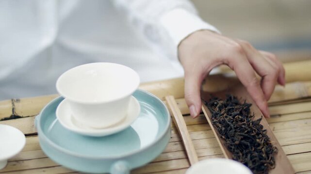 Loose Leaf Tea with Gaiwan on Bamboo Tray