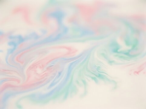 Abstract watercolor brush strokes with soft pastel colors.
