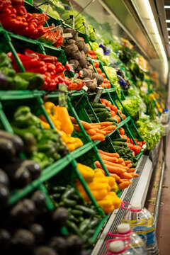 Colorful fresh organic vegetables in supermarket display