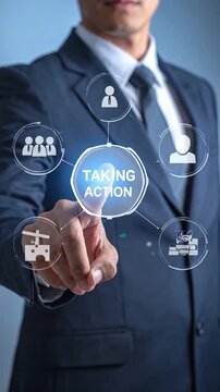 Businessman touching a virtual taking action button