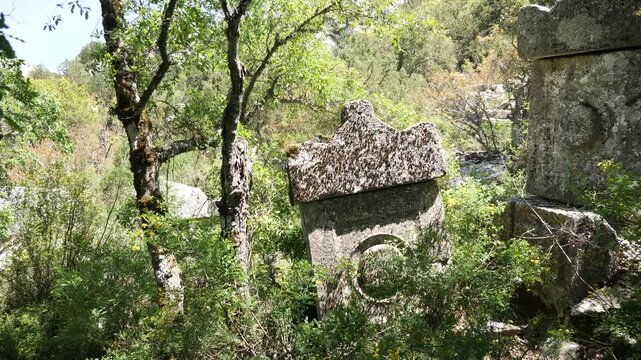 Destroyed greek tombs and ancient burials in Southwest necropolis at ancient city of Termessos near Antalya, Turkey