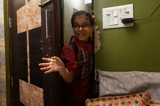 girl saying her goodbye before going to school 