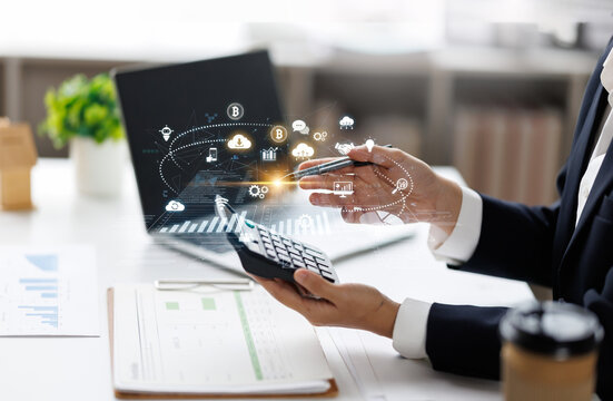 Business woman analysis summary graph reports of business operating expenses and work data about the company's financial statements.