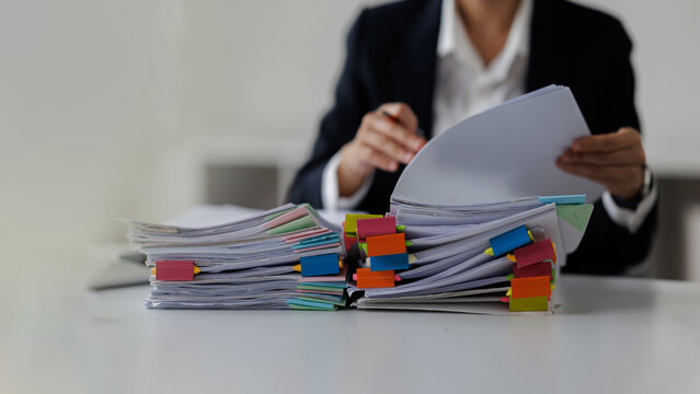 Documents, Business , Auditor businesswoman checking searching document legal prepare paperwork or report for analysis TAX time,accountant Documents data contract partner deal in workplace office