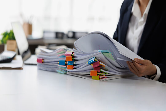 Documents, Business , Auditor businesswoman checking searching document legal prepare paperwork or report for analysis TAX time,accountant Documents data contract partner deal in workplace office