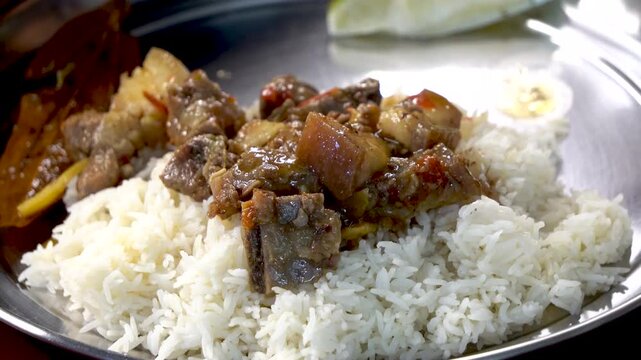 Boil pork served with rice in trational Northeast Indian Assamese style