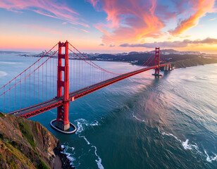 Iconic Golden Gate Bridge at Sunset with Dramatic Sky Over San Francisco Bay. © pintu