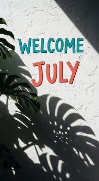 Welcome July greeting with tropical leaves and text overlay.