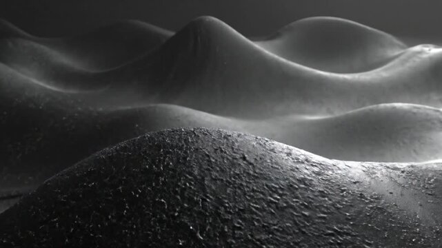 Abstract dark waves with a textured surface in monochrome tones