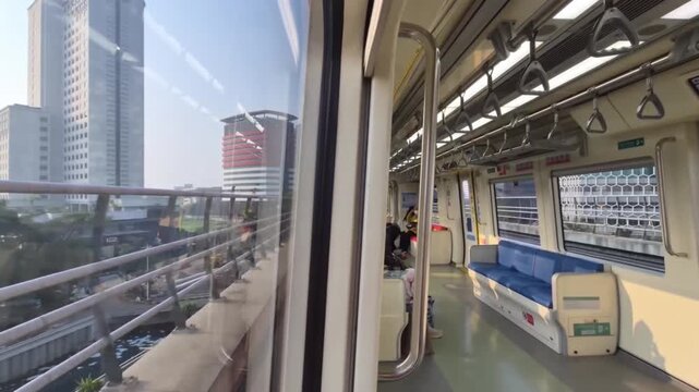 POV Inside a Moving MRT Train Through the City