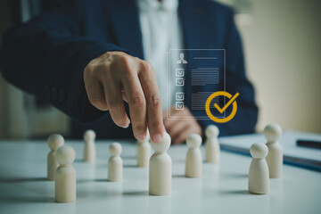 Employee selection approval with businessperson choosing candidate figurine for HR hiring process digital profile review talent assessment workforce planning and recruitment success © Custard Pixel