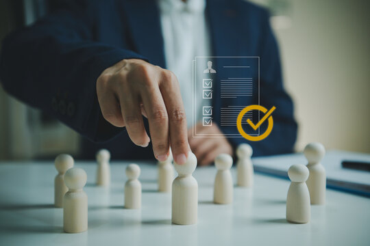 Employee selection approval with businessperson choosing candidate figurine for HR hiring process digital profile review talent assessment workforce planning and recruitment success