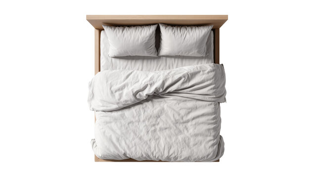 Wooden bed with white pillows and duvet