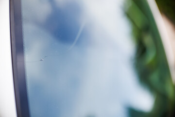 Naklejka premium Close up of crack in windscreen