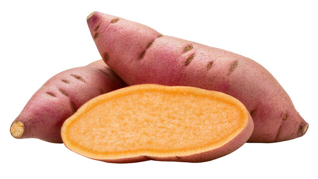 Sweet potatoes, one cut in half showing orange flesh
