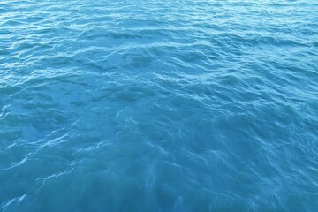 Obraz premium High angle view of beautiful blue sea water surface with gentle ripples and waves