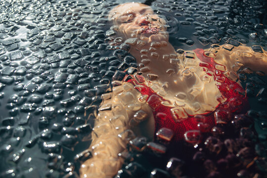 An immersed recovery scene shows a woman in an ice bath for cold therapy.