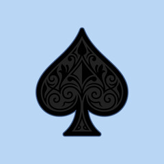 Fototapeta premium Ornate black spade symbol on a light blue background